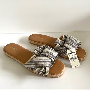 BRAND NEW w/ tags. Express stripe slip-on sandals.